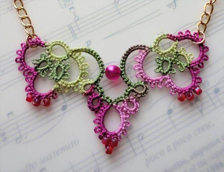 Pink Crochet Necklace Laying on Music Book