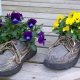 Recycling shoes for planters and backyard decorating with flowers