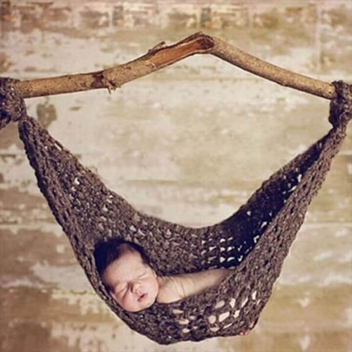This adorable newborn hammock photography prop is handmade using a super soft thick and chunky acrylic wool blend yarn. It is the perfect baby photo prop for your sleeping newborn. And YOU get to choose the color (see the color grid for color choices and then use the dropdown menu to select your color).