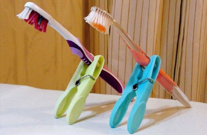 toothpaste dispenser with toothbrush holder