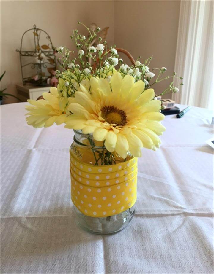 Yellow mason jar centerpiece with ribbon ...
